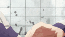 a person 's hand is reaching out towards another person