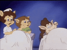 a group of cartoon pigs are standing around a woman in a hospital bed .