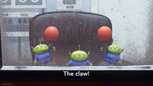 three toy story aliens are holding balls in their hands with the caption the claw