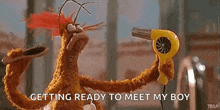 a stuffed animal is holding a yellow hair dryer in its hand .