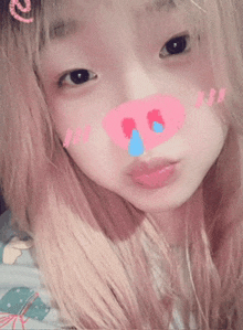 a girl with a pig nose and tears on her face