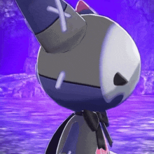 a close up of a stuffed animal with a cross on it 's head