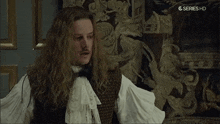 a man with long hair and a mustache is on a g series hd channel