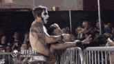 a wrestling match is being broadcasted live on iwtv.live