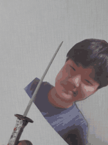 a picture of a boy with a sword sticking out of his chest