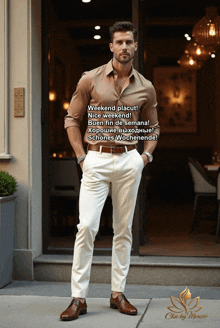 a man wearing a brown shirt and white pants is standing in front of a restaurant