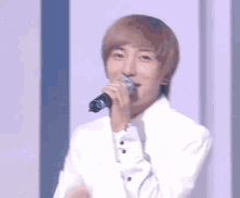 Leeteuk Putting Up The Peace Sign GIF - Leeteuk Peace Peace Out GIFs