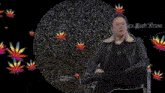 a pixelated image of a man in a leather jacket sitting in front of a rolling stone logo