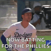 a dodgers baseball player is batting for the phillies