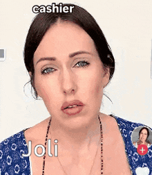 a woman in a blue shirt with the name joli on her face