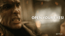 an advertisement for netflix shows a man with his mouth open and says open your eyes