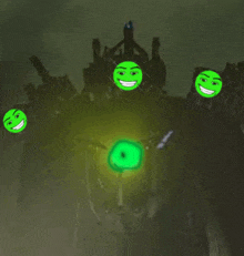 a group of green smiley faces are flying around a green object in the dark .