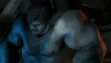 a close up of a man 's chest with the word infinity on the bottom right