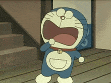 a cartoon character named doraemon is standing on a wooden floor with his mouth open