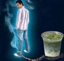 a man chained to a cup of green liquid