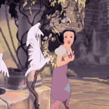 snow white from snow white and the seven dwarfs is running away from a flock of birds