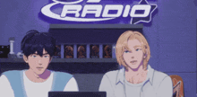 a couple of anime characters sitting in front of a sign that says radio