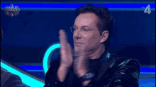 bravo gerard joling the masked singer clapping round of applause