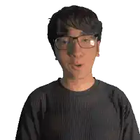 a man wearing glasses and a black shirt with the name chris on it