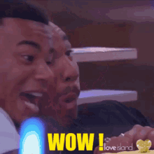 a man with a surprised look on his face and the word wow in yellow letters