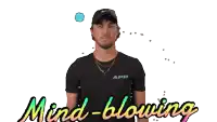 a man in an app shirt is blowing a donut in the air