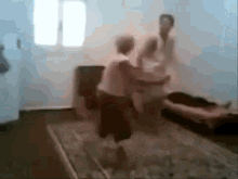 a group of people are dancing in a room with a window .