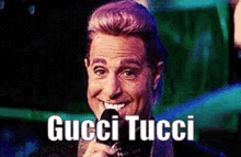 Stanley Tucci Gucci Tucci GIF - Stanley Tucci Gucci Tucci Hunger Games GIFs