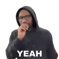 a man wearing glasses and a hoodie says yeah