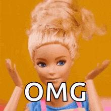 a barbie doll with a bun on her head and the word omg written on it