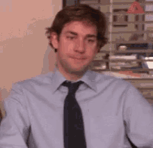 The Office Jim GIF - The Office Jim Laugh GIFs