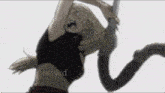 a blurry picture of a girl with the words nsnixd on the bottom right