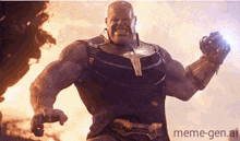 thanos from the movie avengers infinity war is holding his fist up in the air