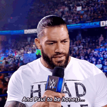 Roman Reigns And Paul To Be Honest GIF - Roman Reigns And Paul To Be Honest Paul Heyman GIFs