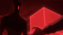a person is holding a sword in front of a red cube
