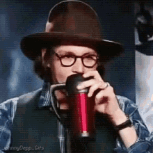 Johnny Depp Drink GIF - Johnny Depp Drink Hat GIFs