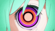 a close up of a person 's eye with a purple and orange circle