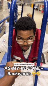 a man wearing glasses and a red vest with the words brain teaser / iq test as my in-come + backwards