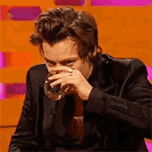 Harry Styles Drinks GIF - Harry Styles Drinks Smile GIFs