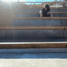 a skateboarder is doing a trick on a set of stairs that says " awesome " on the bottom