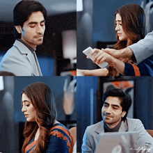 a man and a woman are sitting in front of a laptop and a cell phone