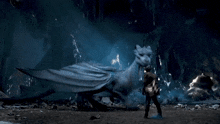 a person is being attacked by a white dragon in a cave