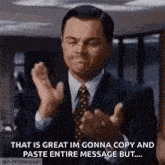 a man in a suit and tie is clapping his hands and saying that is great im gonna copy and paste entire message but .