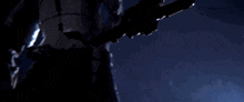 a blue light is shining on a very dark room