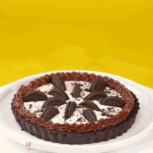 an oreo pie is on a white plate