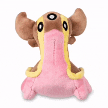 a stuffed animal with pink spots and a yellow stripe around its neck