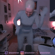 a woman in a bodysuit is dancing in a room with a twitch logo and a tiktok logo