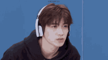 a close up of a person wearing headphones with chenshiyan written in the corner