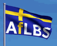 a blue flag with a yellow cross and the word ailbs on it