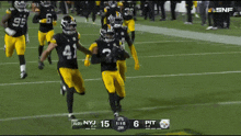 a football game between pittsburgh and new york
