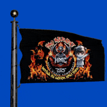 a black flag on a pole that says hmg 2025